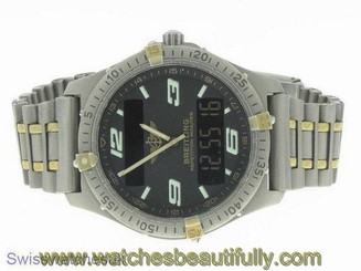 BREITLING AEROSPACE TITANIUM & GOLD MENS WATCH W/ BOX & PAPERS