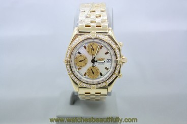 BREITLING CHRONOMAT 18K YELLOW GOLD DIAMOND ENCRUSTED WATCH REF:K13048