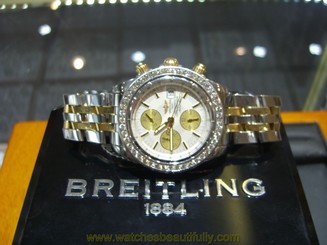 PRE-OWNED BREITLING CHRONOMAT EVOLUTION 18K TWO-TONE DIAMOND BEZEL WATCH B13356