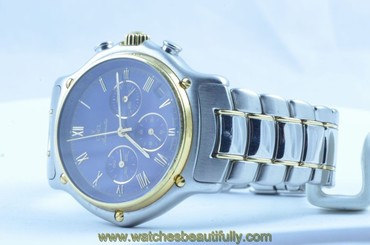 EBEL 1911 STAINLESS STEEL CHRONO AUTOMATIC STEEL/GOLD TOP CONDITION WITH BAND