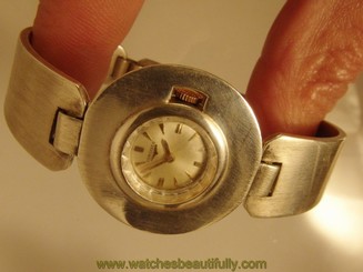 2580VINTAGE LONGINES STERLING SILVER WATCH-BRACELET, bangle style, circa 1960-70