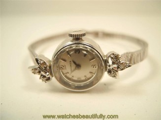 VINTAGE 1967 LADIES LONGINES 14KT WG AND DIAMONDS WRISTWATCH.