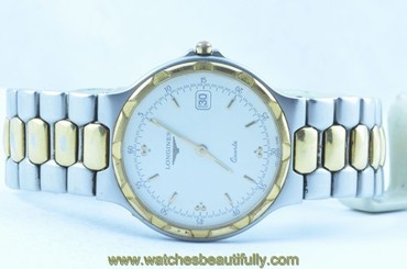 LONGINES CONQUEST MEN'S WATCH QUARTZ TOP CONDITION 34MM STEEL/GOLD