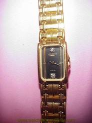 Gold colored Swiss Longines QWR Ladies Watch w/diamonds