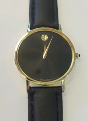 MOVADO 14K GOLD SWISS WATCH. BRAND NEW LEATHER BAND,UNISEX.