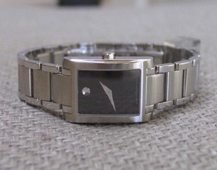 LADIES MOVADO 0606404 CERTE WRISTWATCH WITH BLACK MUSEUM DIAL (retail $995)