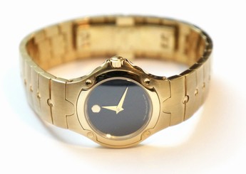 Movado Sports Edition Gold Tone Ladies Swiss Quartz Watch 0604726 Black Dial