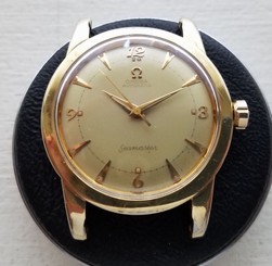 Selling Used Vintage Omega 354 Bumper Wind in a Yellow Gold over Stainless Case.