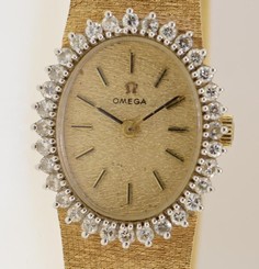 Omega Vintage 14K Yellow Gold Mechanical Ladies watch with Diamond Bezel