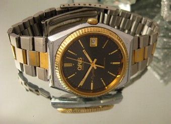 Oris Exzecutive date watch working swiss made two tone bracelet fluted bezel