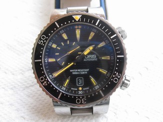 MEN'S ORIS DIVER,1000M,ALL SS,REF 7609,AUTO,DATE,8 1/3" W,45MM DIA,EXPANDABLE