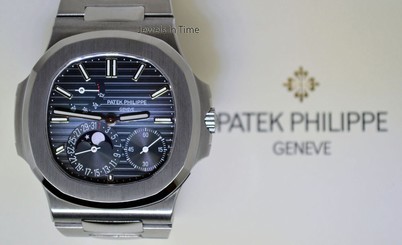 Patek 5712 Nautilus Complications Steel Mens Watch Box/Papers MINT 5712/1A-001