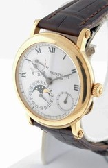 Patek Philippe Power Reserve Moonphase 5054J RARE 18k Yellow Gold gent's watch.