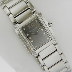 Patek Philippe Twenty-4 Stainless 4910/10A-010 Quartz Silver Dial Ret: $12,100 848475147925