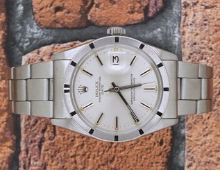 Timeless Mens Stainless Steel Silver Dial Rolex Oyster Perpetual Date.