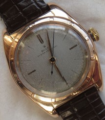Rolex Bubbleback automatic mens wristwatch 18K solid Gold Case Ref. 5011 32 mm.