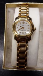 LADIES 18 KT BAUME & MERCIER WATCH