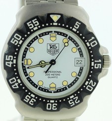 EXCLNT COND VINTAGE MID-SIZE TAG HEUER FORMULA 1 WA1218 QUARTZ WHITE DIAL 35MM
