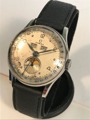 OMEGA Cosmic Triple Date Moon Phase Watch Ref. 2471-3. Cal 27 DL PC 1940s
