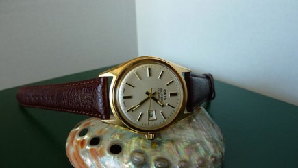 Oris Super hand winding gold plated mens watch.